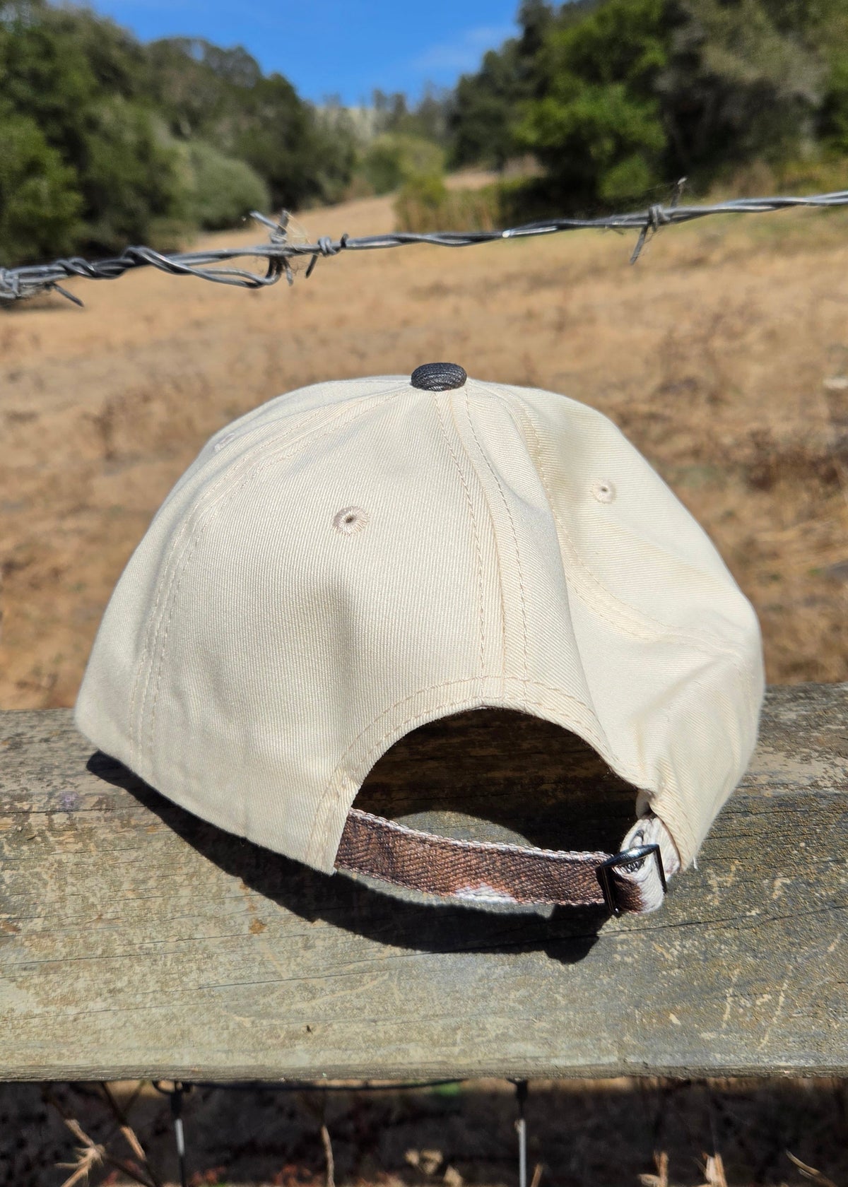 American Outlaw- Cow-print Trucker Hat